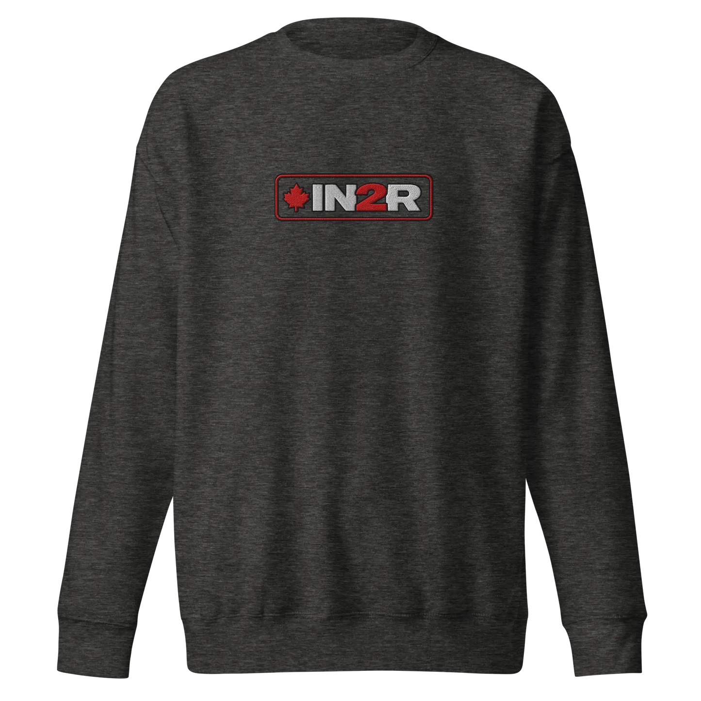 A dark heather gray crewneck sweatshirt featuring a rectangular chest graphic with the text 'IN2R' in white and red, flanked by a red maple leaf icon, set against a plain white background.