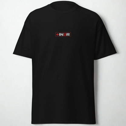 A black short-sleeve crewneck t-shirt with a small rectangular IN2R logo printed on the center chest, displayed against a light gray background.