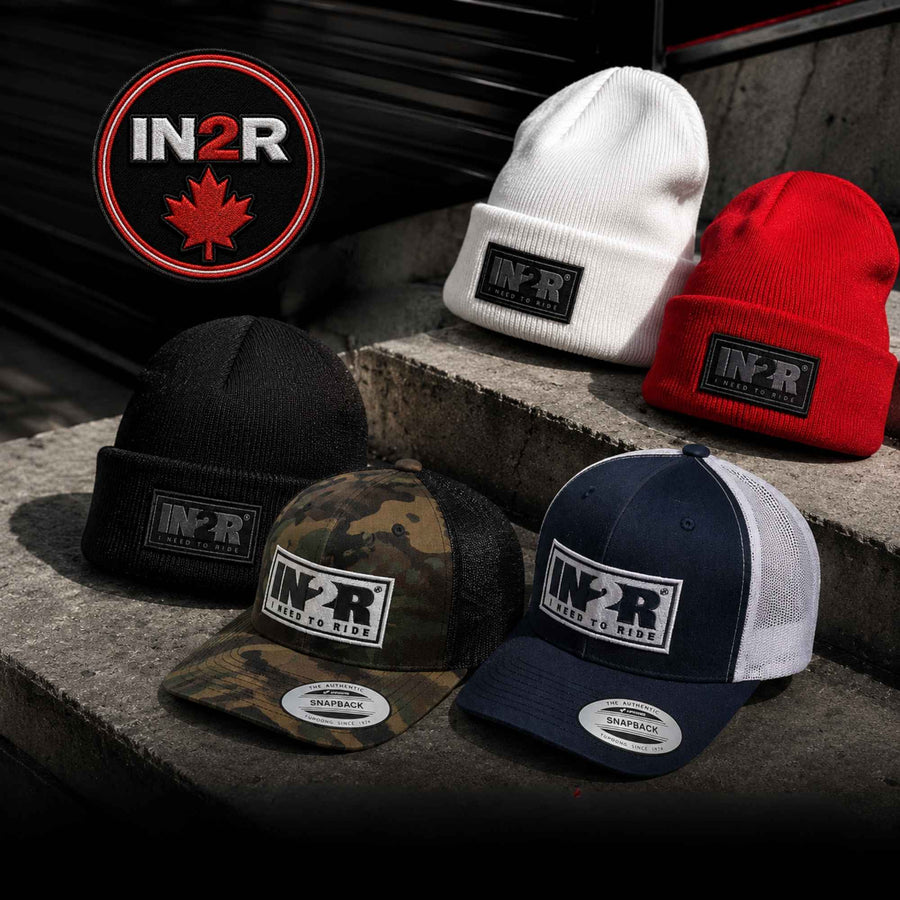 Camo and black IN2R Original trucker snapback hat photographed outdoors
