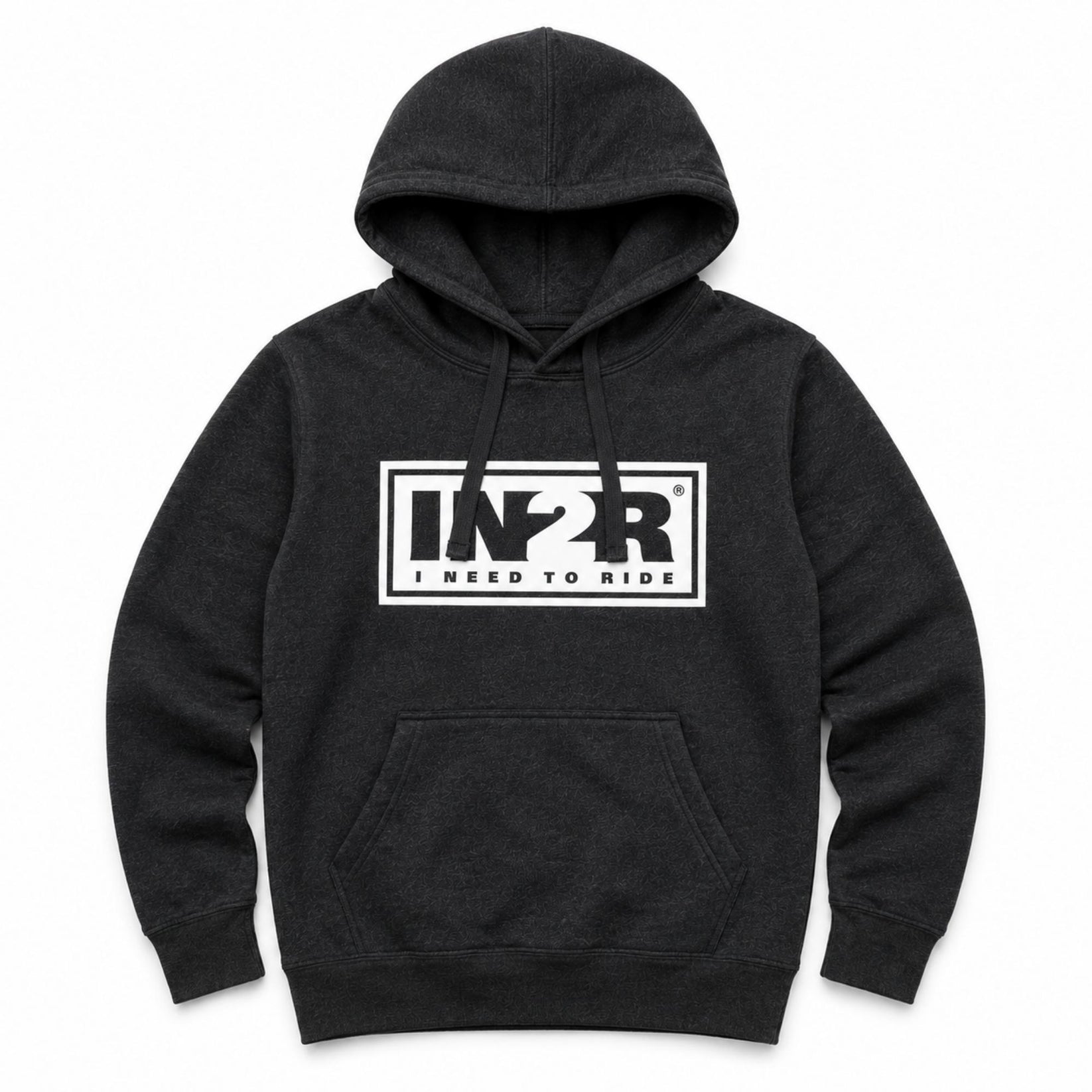 A dark charcoal gray heather pullover hoodie with a white rectangular chest graphic that reads 'IN2R I NEED TO RIDE'. The hoodie features a front kangaroo pocket and drawstring hood, shown against a plain white background.