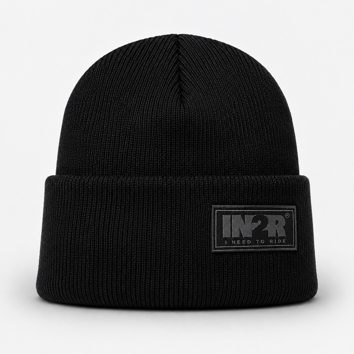 Black IN2R Original Knit Beanie with signature woven logo patch and fold-over cuff.