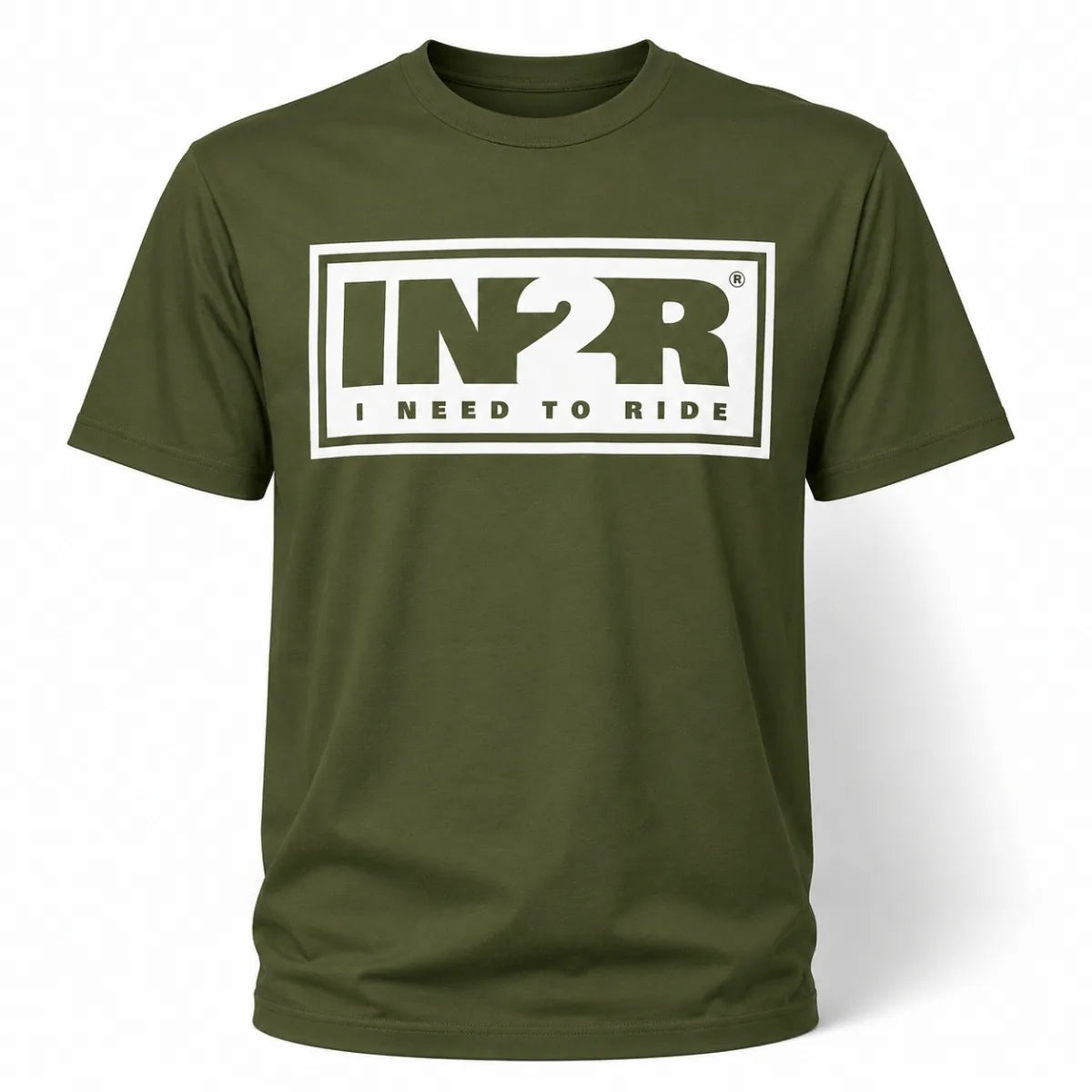 An olive green short-sleeve t-shirt with a white graphic print on the chest reading 'IN2R I NEED TO RIDE' inside a white rectangular border.
