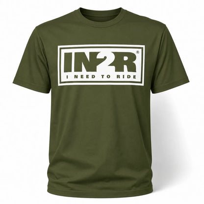 An olive green short-sleeve t-shirt with a white graphic print on the chest reading 'IN2R I NEED TO RIDE' inside a white rectangular border.