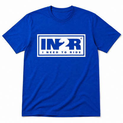 A royal blue short-sleeve crewneck t-shirt with a white graphic on the chest reading 'IN2R I NEED TO RIDE' inside a white rectangular border.