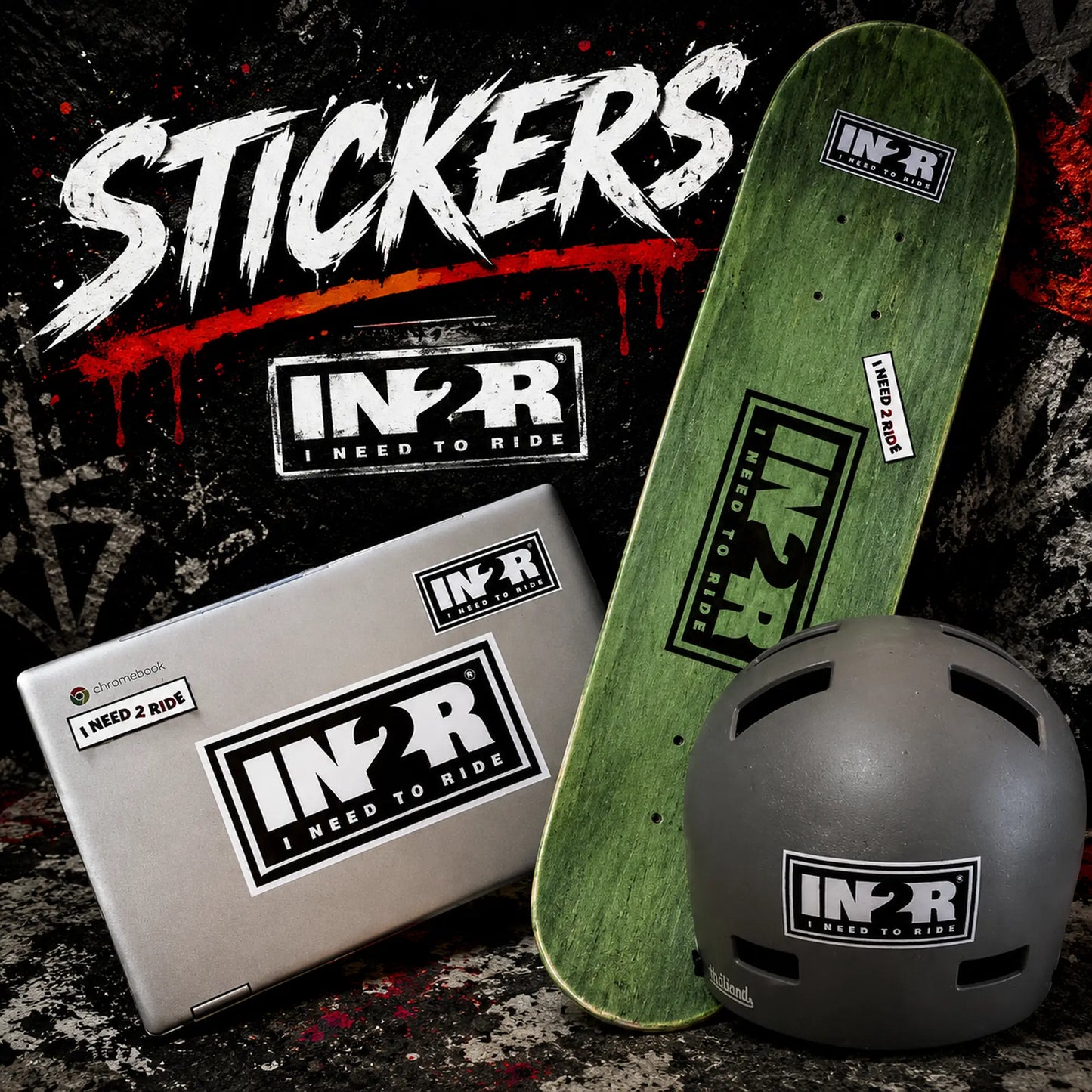 A promotional product shot showing multiple IN2R stickers applied to a green skateboard deck, a silver laptop, and a dark gray helmet. Large white 'STICKERS' text appears at the top over a dark graphic background.