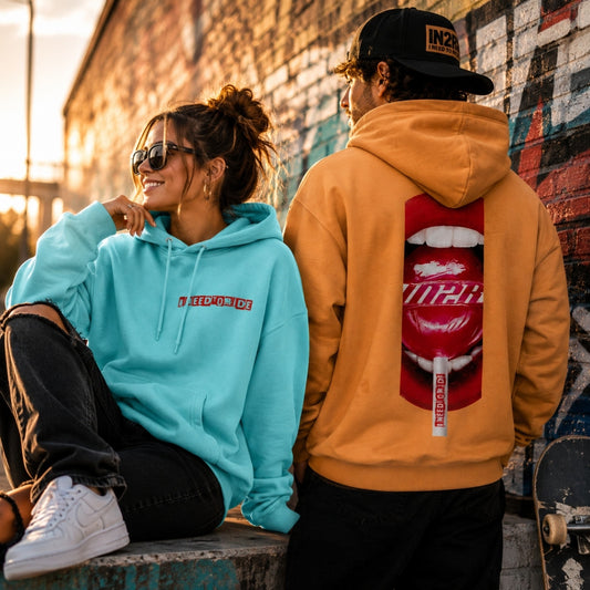 Sweet Sensations Premium Heavyweight Hoodies in Mint and Peach featuring exclusive IN2R artwork and oversized back graphics.