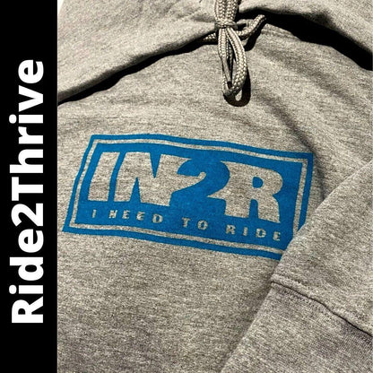Athletic heather IN2R Ride2Thrive unisex hoodie with blue Original chest logo